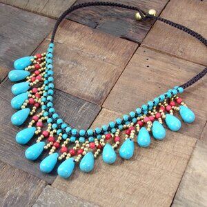 Turquoise fringe bead necklace with small teardrop shape stones and red stones